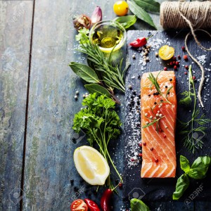 29035588-Delicious-portion-of-fresh-salmon-fillet-with-aromatic-herbs-spices-and-vegetables-healthy-food-diet-Stock-Photo